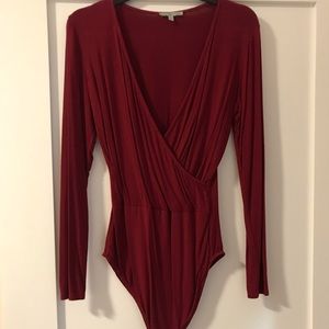 Red v neck body suit